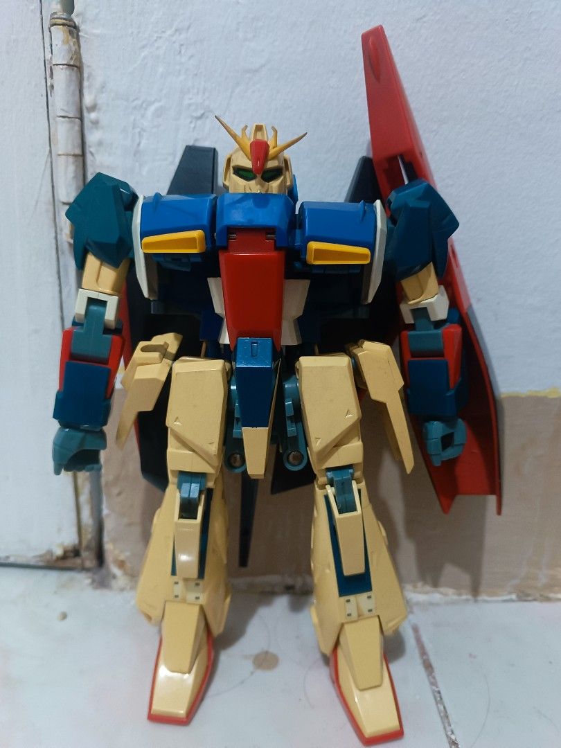 1985 Vintage Deluxe Gundam 2pcs (Category: Gundam & Model Kits) located in Manila. Submitted by xxxmateo (Listing ID 1470941434, Image 1). Description: NOTE : THIS IS A VINTAGE SO MANAGE YOUR EXPECTATION . THERES SOME RESTORATION BUT THE PRICE IS TOTALLY FAIR ENOUGH - Authentic Bandai Zeta Gundam model kit - Fully articulated build with classic color scheme (blue, yellow, red, and dark green) - Transforms into Wave Rider mode - Condition: Minor d
