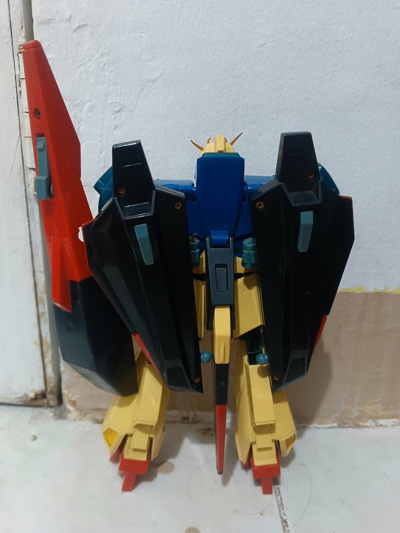 1985 Vintage Deluxe Gundam 2pcs (Category: Gundam & Model Kits) located in Manila. Submitted by xxxmateo (Listing ID 1470941434, Image 2). Description: NOTE : THIS IS A VINTAGE SO MANAGE YOUR EXPECTATION . THERES SOME RESTORATION BUT THE PRICE IS TOTALLY FAIR ENOUGH - Authentic Bandai Zeta Gundam model kit - Fully articulated build with classic color scheme (blue, yellow, red, and dark green) - Transforms into Wave Rider mode - Condition: Minor d