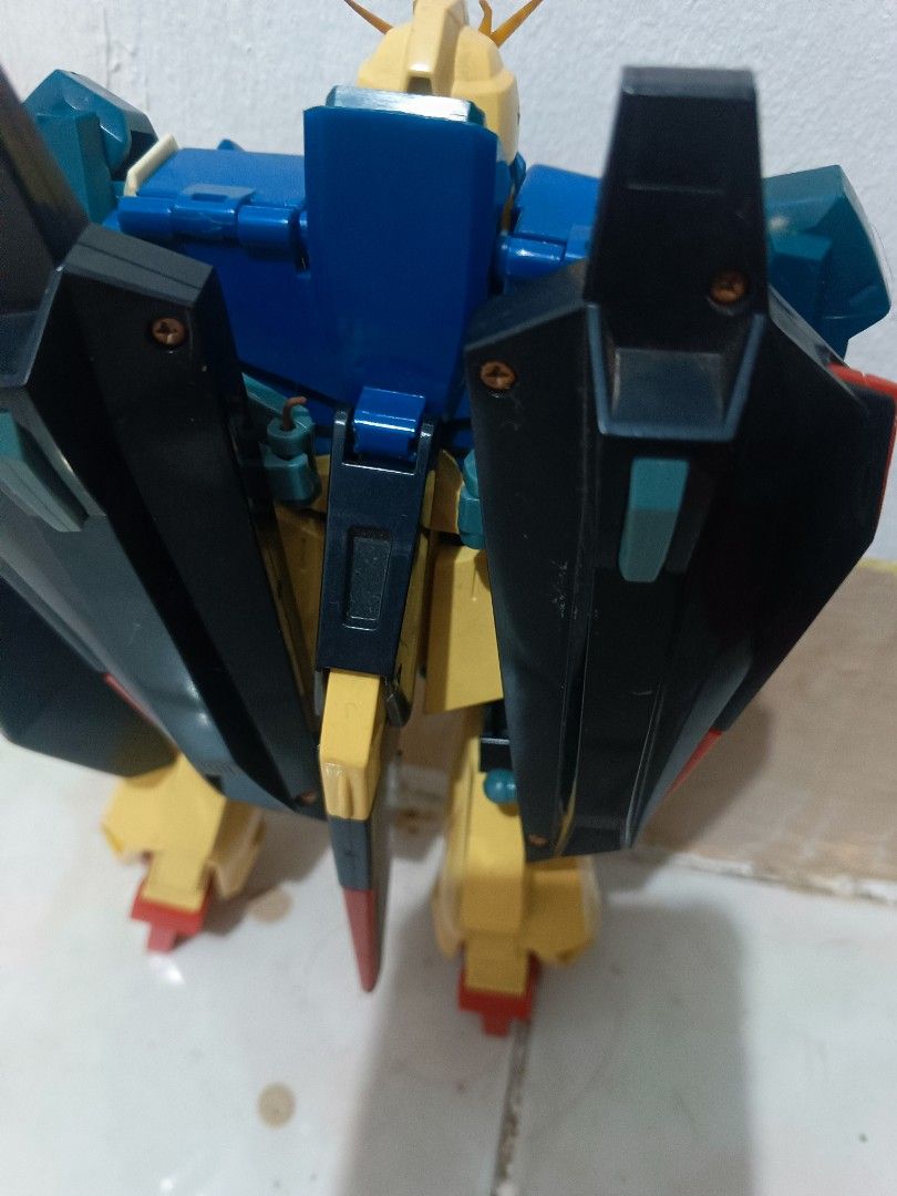 1985 Vintage Deluxe Gundam 2pcs (Category: Gundam & Model Kits) located in Manila. Submitted by xxxmateo (Listing ID 1470941434, Image 3). Description: NOTE : THIS IS A VINTAGE SO MANAGE YOUR EXPECTATION . THERES SOME RESTORATION BUT THE PRICE IS TOTALLY FAIR ENOUGH - Authentic Bandai Zeta Gundam model kit - Fully articulated build with classic color scheme (blue, yellow, red, and dark green) - Transforms into Wave Rider mode - Condition: Minor d