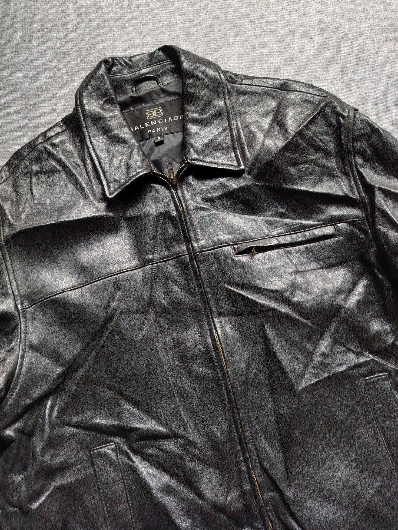 1997 Balenciaga by Nicolas Ghesquière Leather Jacket (Category: Coats, Jackets and Outerwear) located in Taguig. Submitted by _theroom.ph (Listing ID 1470976921, Image 2). Description: - Authentic Balenciaga Paris black leather jacket - Size: 6 - Closure: Front zip with standard shirt collar and buttoned cuffs - Pockets: Small chest zip pocket, two lower hand pockets, and one internal buttoned pocket - Interior: Fully lined - Condition: Excellent