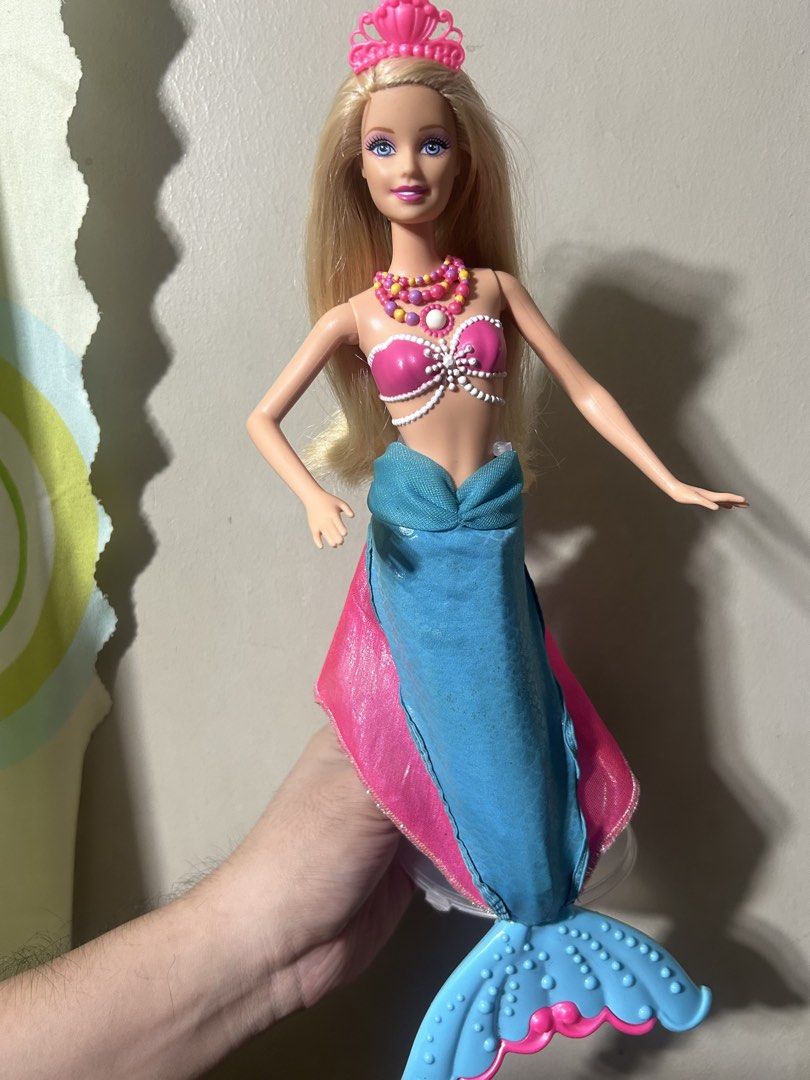 2014 Barbie Pearl Princess (Category: Action & Battle Toys) located in Taguig. Submitted by wonderstrucks13 (Listing ID 1471105111, Image 1). Description: Barbie Pearl Princess -like new COMPLETE w/ Brush -gimmick working -change color -slight negotiable .
