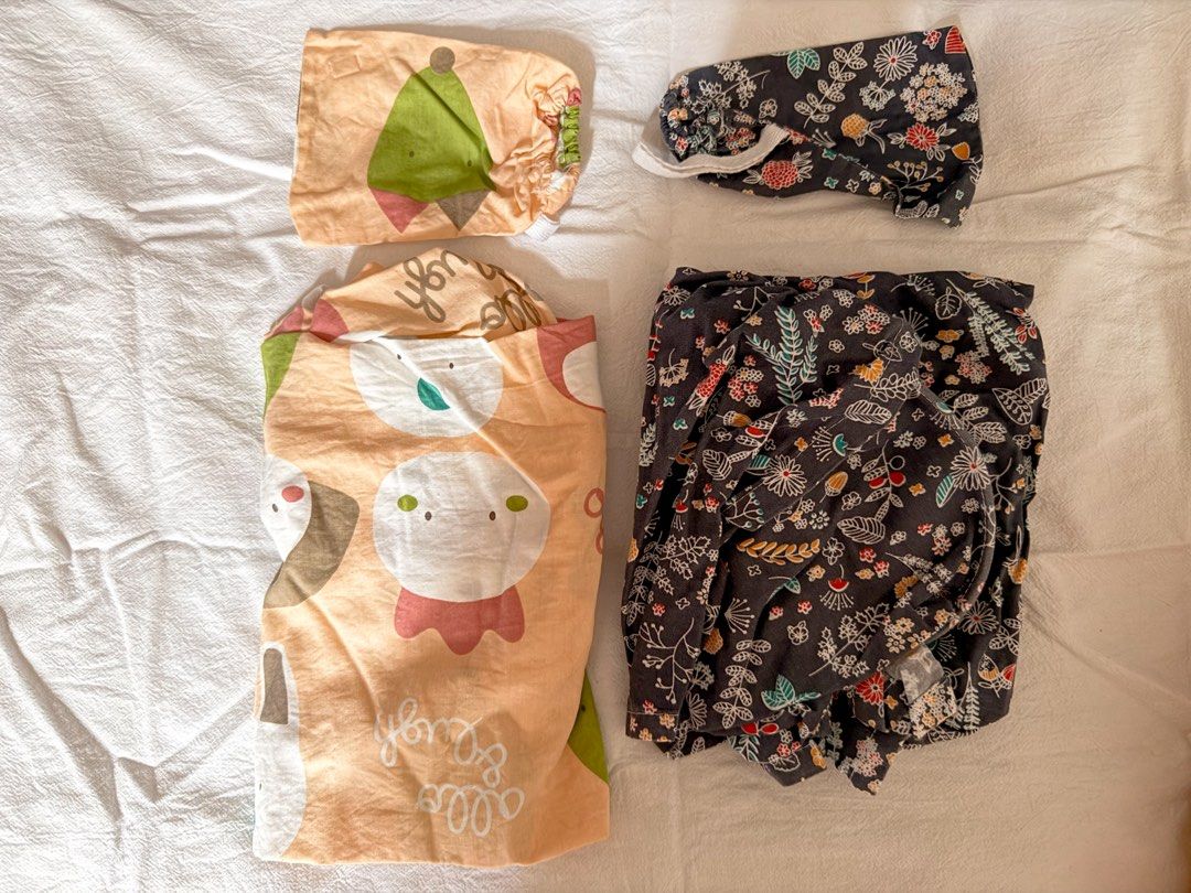 2 nursing cover (Category: Cots & Cribs) located in Pasig City. Submitted by khaleisi (Listing ID 1470975309, Image 1). Description: - get 2 for 110 - 1st set: Cute animal prints on a soft peach background - 2nd set: Colorful floral and botanical pattern on dark grey fabric - Pre-washed and 100% ready for immediate use.