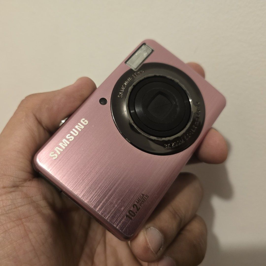 2nd Hand Samsung PL50 (10.2 Megapixels) – No Issues (Category: Cameras) located in Quezon City. Submitted by manila_segunda_mano (Listing ID 1471036650, Image 1). Description: 2nd Hand Samsung PL50 (10.2 Megapixels) – No Issues Maganda output nito. IG Vibe. Steal Price for a PINK digicam. Price: ₱4.8K Inclusions: • Unit (please zoom in/out for cosmetic details) • Battery • Strap • Charger Interested? Please send us a direct message for a faster t