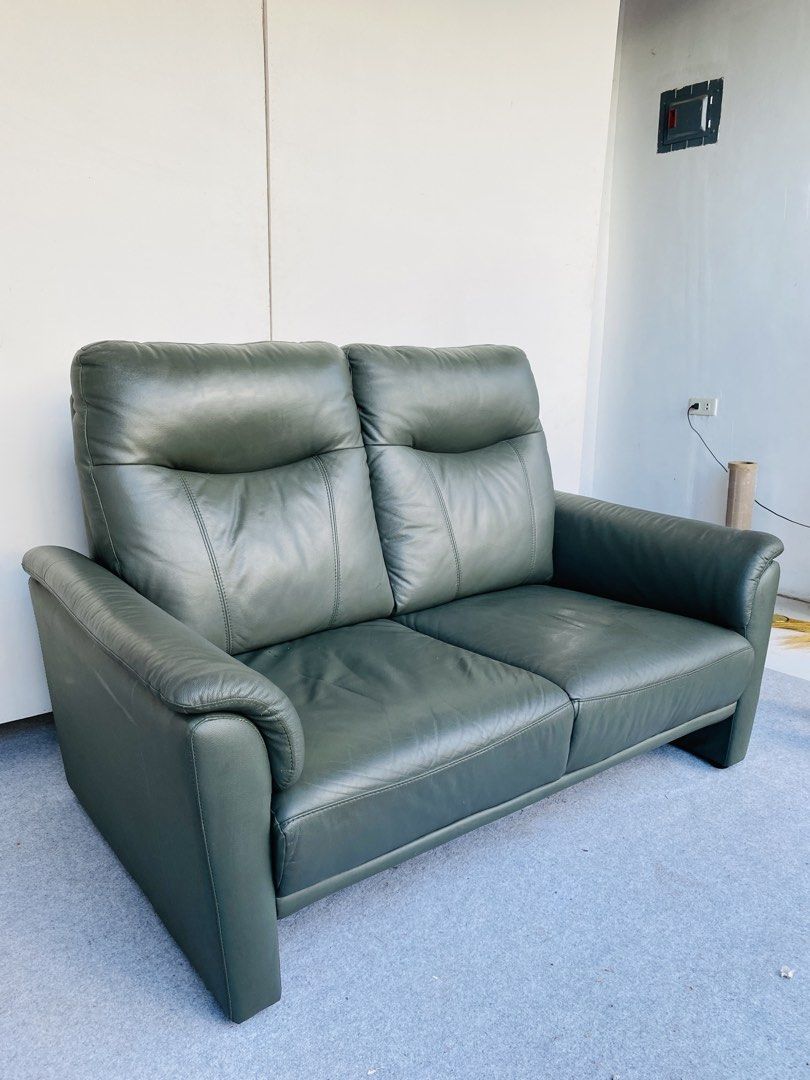 2-Seater Highback Leather Sofa (Category: Sofas) located in Manila. Submitted by elliefurnies31 (Listing ID 1470946253, Image 2). Description: "JAPAN SURPLUS" 2-SEATER HIGHBACK DARK GREEN LEATHER SOFA SIZE: 56L" x 36W" x 16Sh" x 37H" inches (AS-IS ITEM) IN GOOD CONDITION.