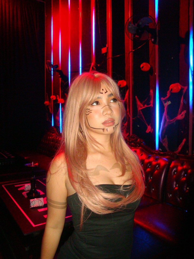 30 inch long layered pink wig with bangs (Category: Hair Accessories) located in Manila. Submitted by basedindasma.rizal (Listing ID 1471041284, Image 2). Description: - Color: Dusty Pink - Length: 30 inches with face-framing layers and full bangs - Material: Soft, heat-resistant synthetic fiber - Condition: Worn once for Halloween (styled as Sukuna) - Inclusion: Comes with original packaging bag and mesh net Price is negotiable..