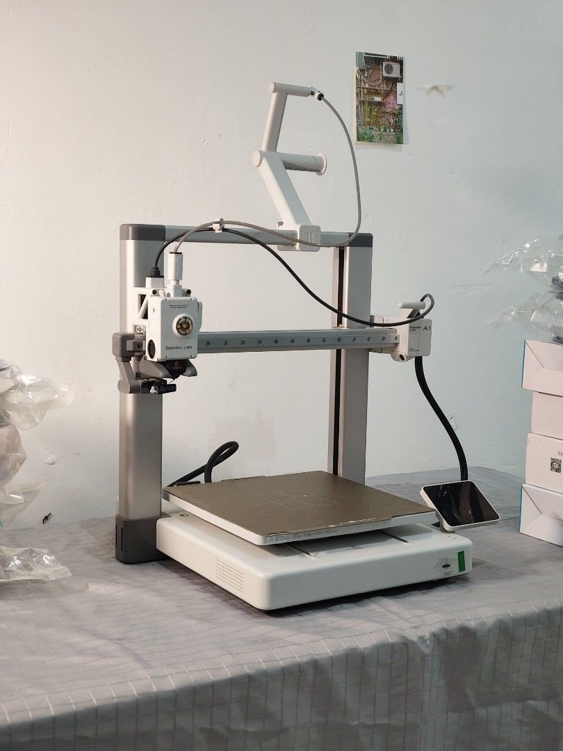 Bambu Lab A1 3D Printer + Filament Bundle (Low Usage) (Category: Printers, Scanners & Copiers) located in Bacoor. Submitted by mangma (Listing ID 1471050584, Image 1). Description: Bambu Lab A1 3D Printer bundled with filaments (worth ₱6,000+). Very lightly used for personal hobby prints only (never used commercially or for print farm duty). Runs smoothly with clean prints out of the box. [KEY SPECS & CONDITION] • Model: Bambu Lab A1 (Full Size /