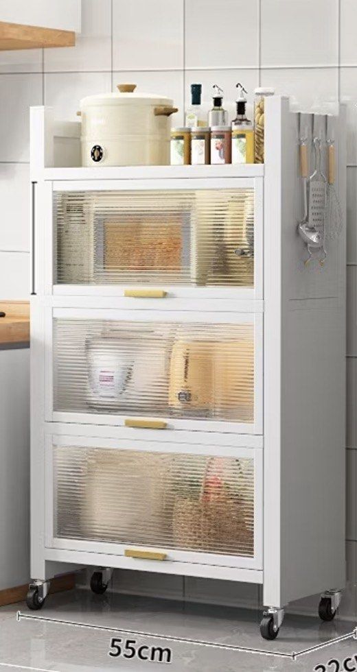 4 Layer White Dustproof Kitchen Cabinet Rack (Category: Shelves, Cabinets & Racks) located in Caloocan City. Submitted by mcarmiladm (Listing ID 1471097494, Image 1). Description: White kitchen storage rack with 4 layers and flip cabinet doors. Chat for actual picture.