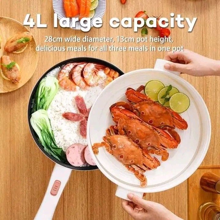 4L Large Capacity Multifunctional Electric Cooker Pan (Category: Cookers) located in Quezon City. Submitted by marecel146 (Listing ID 1470948053, Image 1). Description: - 4L large capacity electric cooker pan - Dimensions: 28cm diameter and 13cm pot height - Multi-task and cook three meals simultaneously - Includes a deep cooking surface and matching steamer tray - Versatile for rice, vegetables, seafood, and crabs - Stylish white handle design w