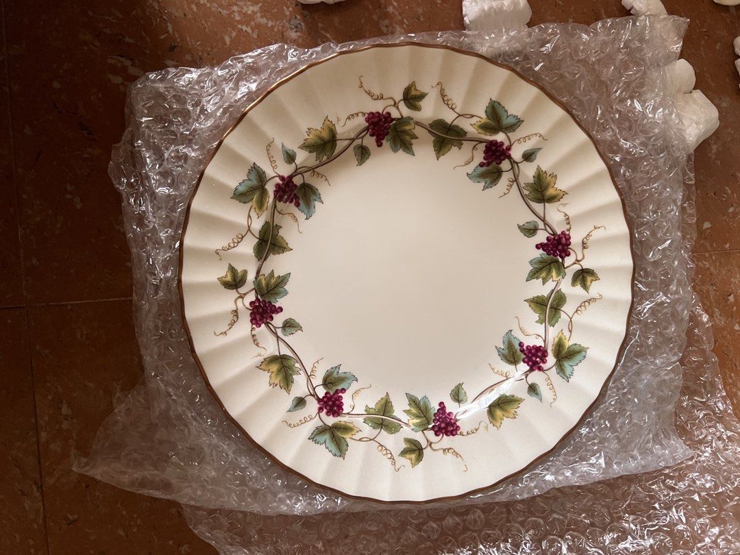 7Pcs Royal Worcester 'Bacchanal' Bone China Plate (Category: Dinnerware & Cutlery) located in Manila. Submitted by wtf.ck_ (Listing ID 1471059751, Image 1). Description: - Brand/Origin: Royal Worcester, Made in England - Pattern: 'Bacchanal' with grape vine wreath, burgundy grapes, and green leaves - Design: Fluted border with luxurious gold trim - Material: Fine bone china.