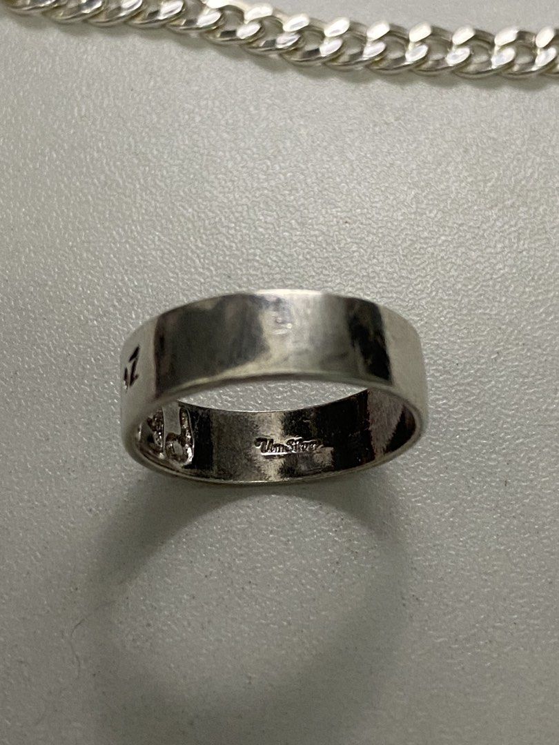 92.5 Sterling Silver Curb Chain Bracelet and Ring (Category: Jewelry) located in Baguio. Submitted by masterroller (Listing ID 1471065715, Image 3). Description: Matching 92.5 silver jewelry set including a classic curb chain bracelet with lobster clasp and a wide band ring stamped with 'PEACE' on the inside. Great everyday accessories to wear together or separately..