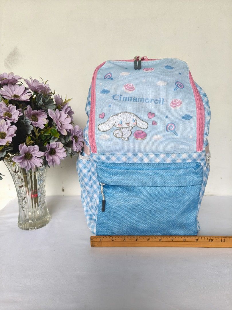 ✨ Sanrio Cinnamoroll Blue Gingham Backpack ✨ no 102 (Category: Backpacks) located in Valenzuela. Submitted by sakura_japan_surplus (Listing ID 1471048239, Image 3). Description: ✨ Sanrio Cinnamoroll Blue Gingham Backpack ✨ An adorable and practical Cinnamoroll school or casual backpack featuring a sweet blue gingham pattern, pink trim, and cute character graphics on the front. Equipped with adjustable shoulder straps and a supportive chest buckle
