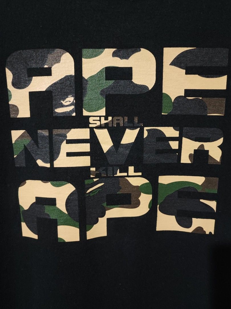A BATHING APE - BAPE 1ST CAMOUFLAGE ASNKA TEE (Category: Tshirts & Polo Shirts ) located in Iloilo. Submitted by gooddimes (Listing ID 1471074141, Image 2). Description: A Bathing Ape - Bape 1st Camouflage 'ASNKA' Tee Authentic Size on tag: Medium Dimes: 19x26L Issue/s: None Color rate: 9.5/10 Excellent condition ₱2,499 +sf Reminders: - All items are thrifted, please manage your expectations - Color may vary due to lighting - Please wash before u