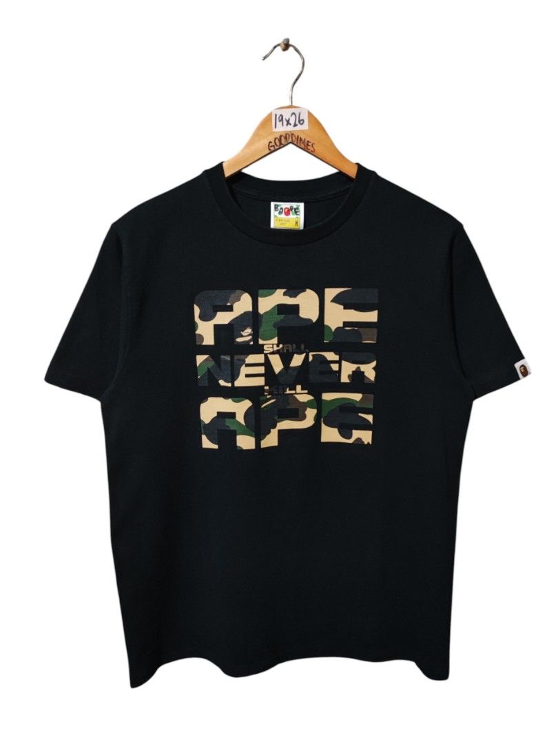 A BATHING APE - BAPE 1ST CAMOUFLAGE ASNKA TEE (Category: Tshirts & Polo Shirts ) located in Iloilo. Submitted by gooddimes (Listing ID 1471074141, Image 1). Description: A Bathing Ape - Bape 1st Camouflage 'ASNKA' Tee Authentic Size on tag: Medium Dimes: 19x26L Issue/s: None Color rate: 9.5/10 Excellent condition ₱2,499 +sf Reminders: - All items are thrifted, please manage your expectations - Color may vary due to lighting - Please wash before u