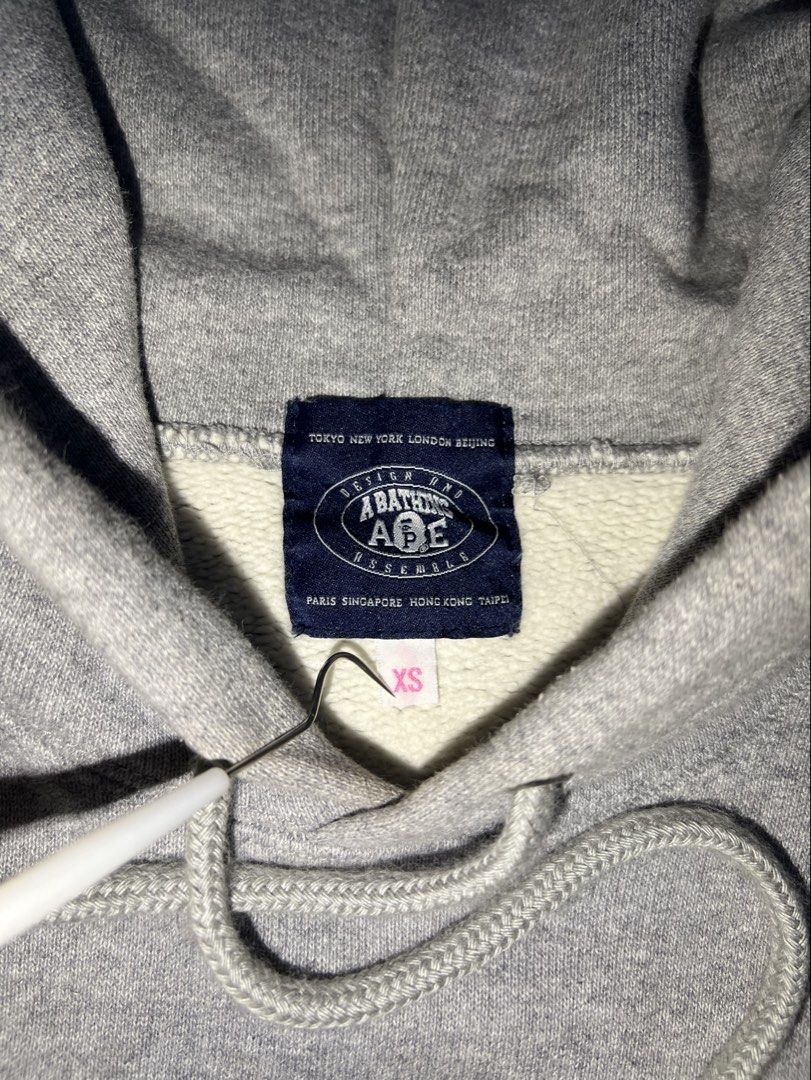 A bathing ape hoodie (Category: Coats, Jackets and Outerwear) located in Las Pinas. Submitted by jayceegarageco (Listing ID 1471094303, Image 3). Description: Bape Authentic Good as new w/yellowish stain Size XS on tag .