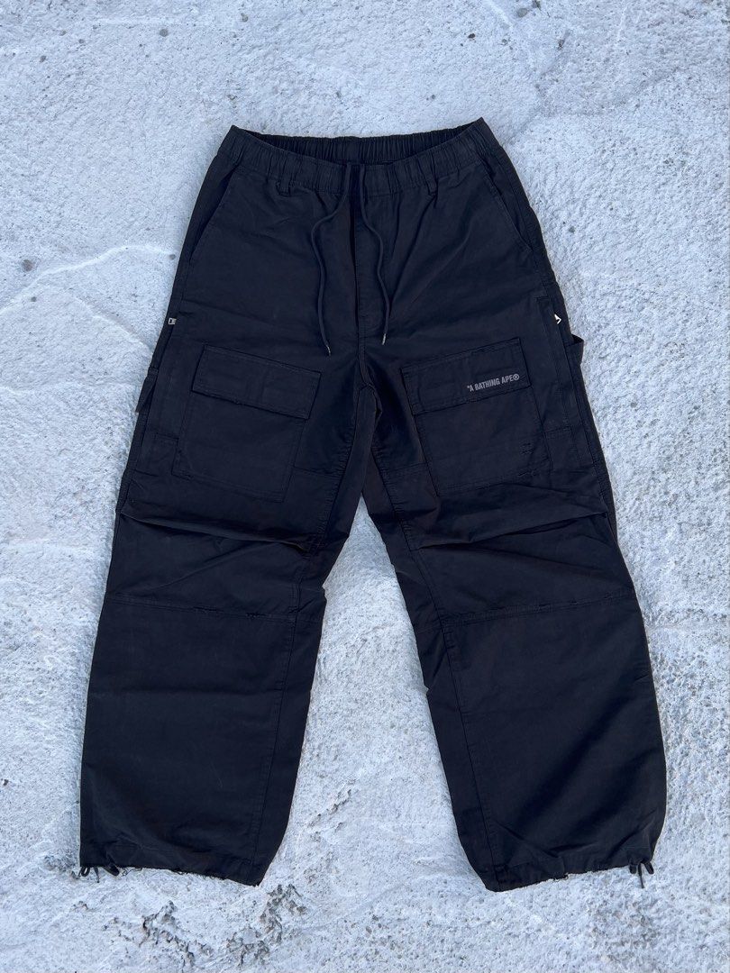 A Bathing Ape Relaxed fit Black Cargo Pants (Category: Joggers) located in Manila. Submitted by dopehits (Listing ID 1471105695, Image 1). Description: Size Small 30-34 No issue Baggy asf 10 pockets 3500 only 📩 Psg nalang pag di na out ✌🏻.