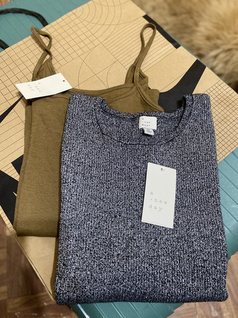 A New Day 2X Tops Set (Category: Sleeveless) located in Batangas. Submitted by lux_kimmy (Listing ID 1470968484, Image 3). Description: - Brand: A New Day - Size: 2X - Condition: Brand new with tags (BNWT) - Set includes: * Sparkly knit sleeveless top in black and silver * Ribbed camisole in brownish olive green - Style: Simple, casual, and easy to mix and match - Perfect for everyday wear or layering.