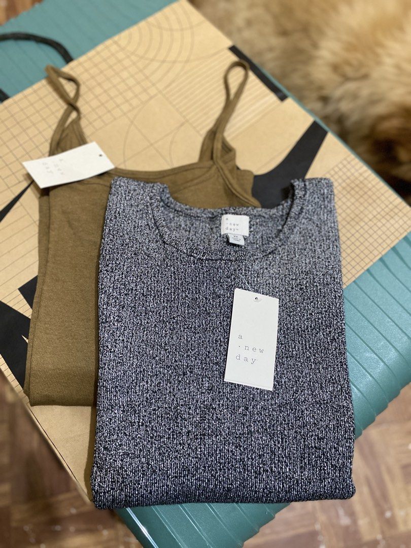 A New Day 2X Tops Set (Category: Sleeveless) located in Batangas. Submitted by lux_kimmy (Listing ID 1470968484, Image 1). Description: - Brand: A New Day - Size: 2X - Condition: Brand new with tags (BNWT) - Set includes: * Sparkly knit sleeveless top in black and silver * Ribbed camisole in brownish olive green - Style: Simple, casual, and easy to mix and match - Perfect for everyday wear or layering.