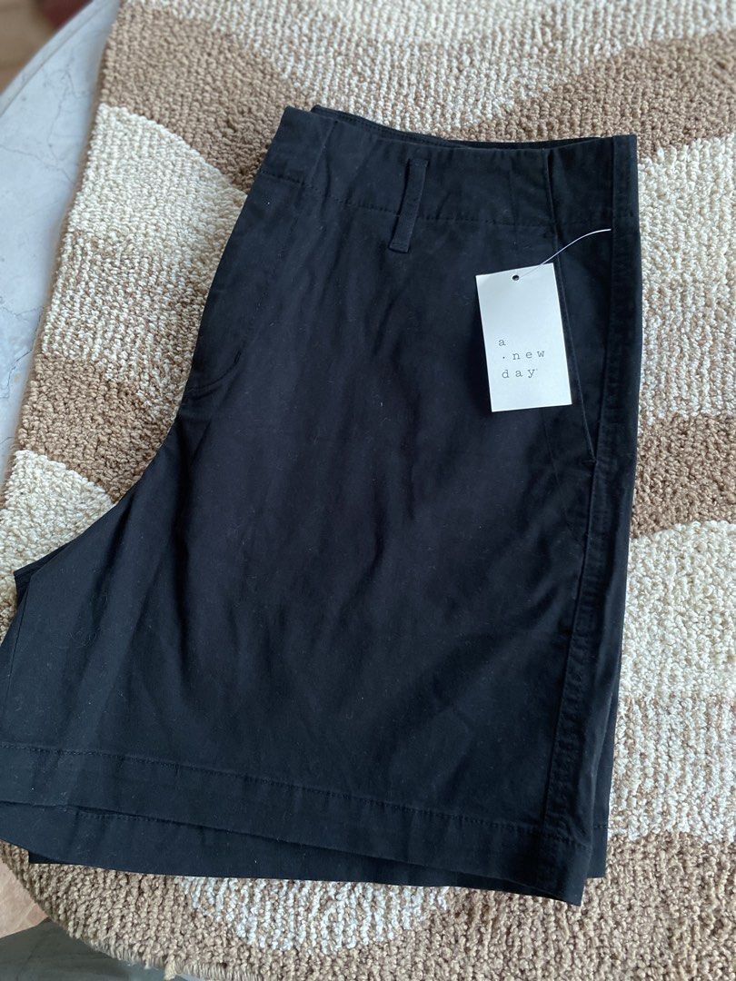 A New Day Black Shorts (Category: Shorts) located in Batangas. Submitted by lux_kimmy (Listing ID 1471047640, Image 2). Description: Black shorts from A New Day. Classic style with belt loops and side pockets. Tag attached, never worn. Waist measures around 34” across based on tape measure. Solid black versatile piece for warmer days..