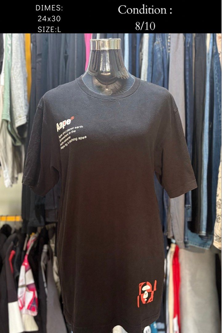 Aape Black T-Shirt Size L (Category: Tshirts & Polo Shirts ) located in Brookes Point. Submitted by grandfish.2f86fc (Listing ID 1470969476, Image 1). Description: - Brand: Aape - Color: Black - Size: Large (24x30 inches) - Design: Universe graphic on chest, Ape logo near bottom hem - Fit: Short sleeves, classic crew neck - Condition: Good overall, well-maintained with plenty of wear left.