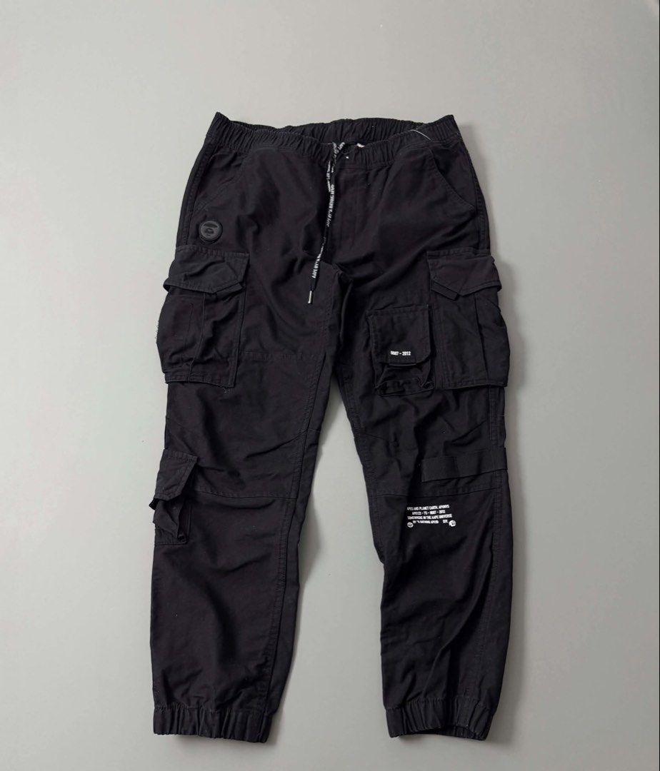 AAPE BY A BATHING APE MEN’S TACTICAL CARGO JOGGER PANTS (Category: Jeans) located in Guagua. Submitted by sweetboyy (Listing ID 1471062059, Image 1). Description: AAPE BY A BATHING APE MEN’S TACTICAL CARGO JOGGER PANTS EXCELLENT CONDITION SIZE MEDIUM ON TAG DIMES: WAISTLINE 34-36 / LENGTH 38.
