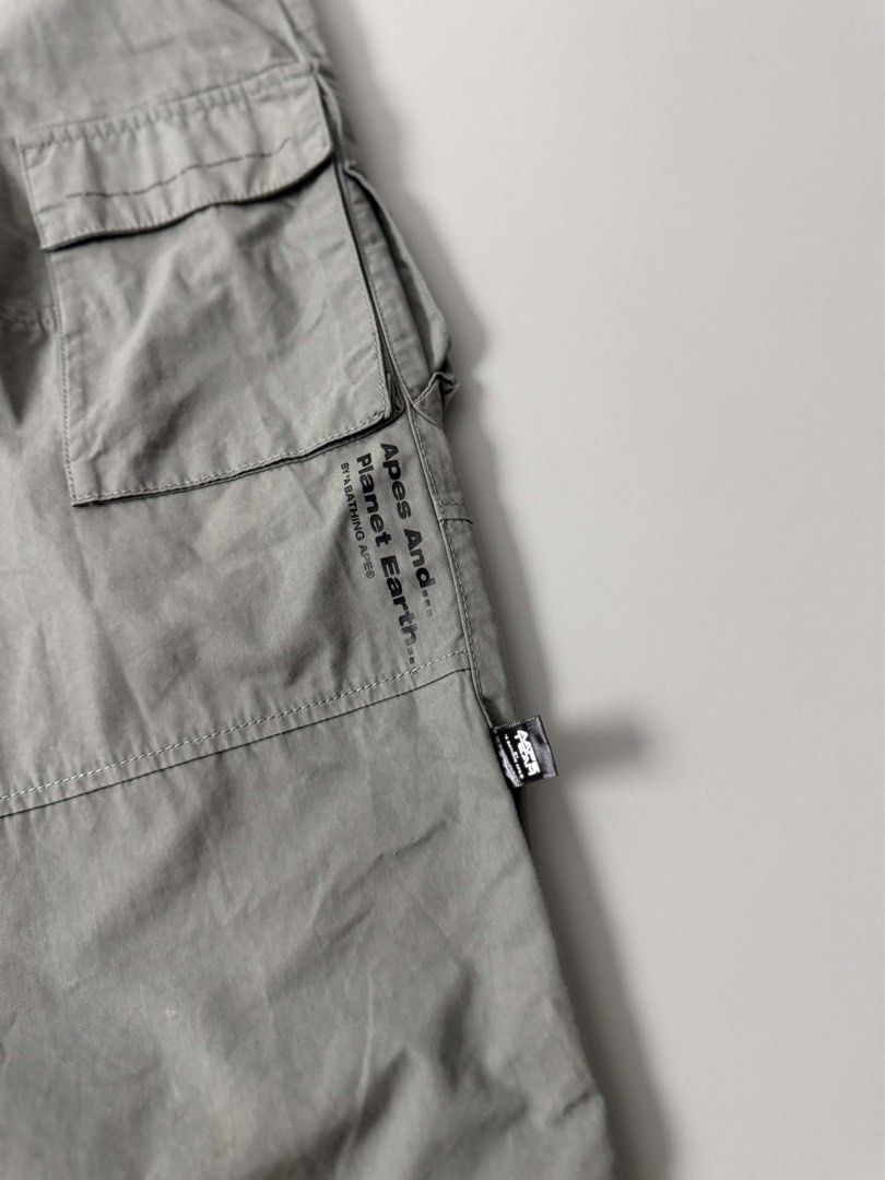 AAPE BY A BATHING APE MOONFACE TAPERED CARGO PANTS (Category: Jeans) located in Guagua. Submitted by sweetboyy (Listing ID 1471042398, Image 3). Description: AAPE BY A BATHING APE MOONFACE TAPERED CARGO PANTS EXCELLENT CONDITION SIZE SMALL ON TAG DIMES: WAISTLINE 30-32 / LENGTH 38.5 / LEG OPENING 8.