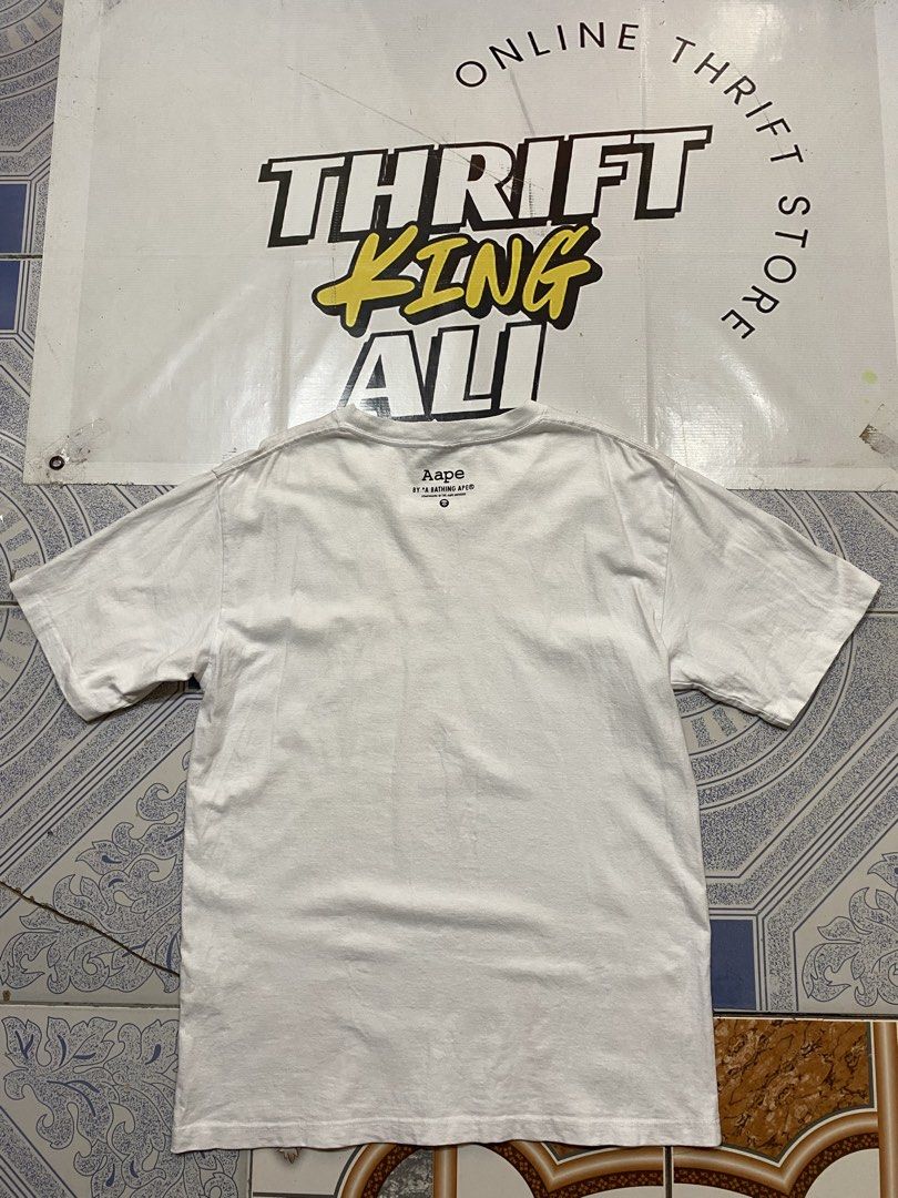 AAPE Graphic Tee (Category: Tshirts & Polo Shirts ) located in Rosario. Submitted by thrift_king_ali (Listing ID 1471046291, Image 2). Description: AAPE Large Dimes: W-22 L-29 no issue excellent condition 450+sf.
