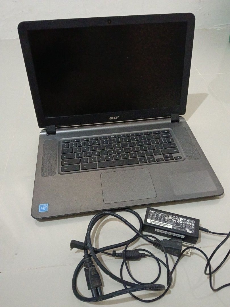 Acer Chromebook Laptop with Charger (Category: Laptops & Notebooks) located in Manila. Submitted by zenbear_6b2d8a (Listing ID 1470936728, Image 2). Description: - Model: Acer Chromebook in a sleek grey finish - Performance: Powered by a reliable Intel processor, perfect for basic daily browsing and typing tasks - Keyboard: Standard Chrome OS layout - Branding: Features the Acer logo on the bezel and Chrome branding on the outer lid - Inclusions: