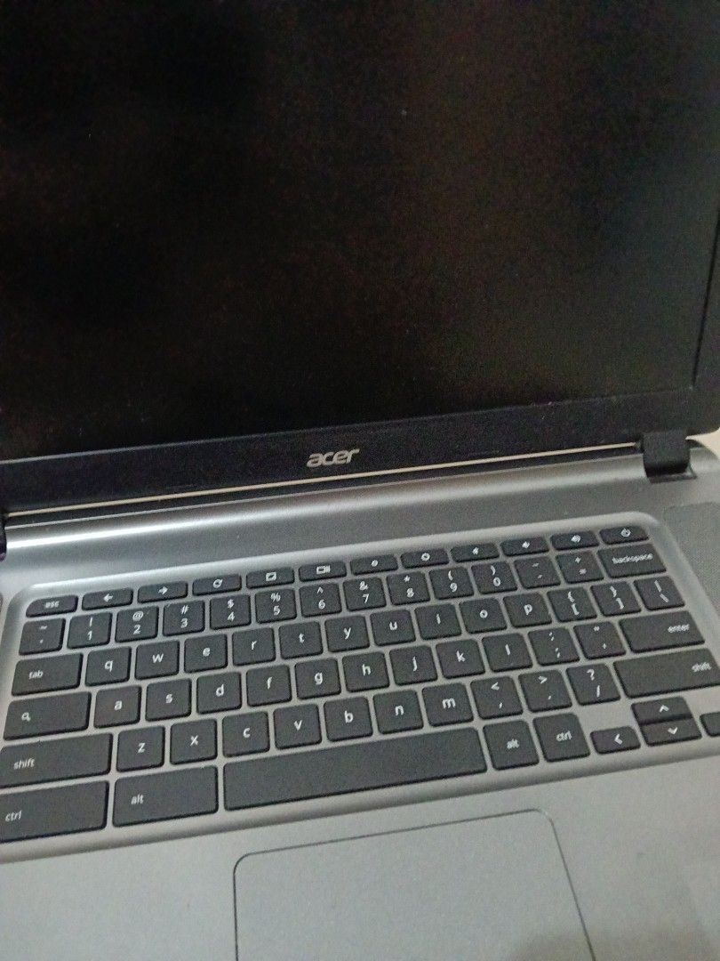 Acer Chromebook Laptop with Charger (Category: Laptops & Notebooks) located in Manila. Submitted by zenbear_6b2d8a (Listing ID 1470936728, Image 3). Description: - Model: Acer Chromebook in a sleek grey finish - Performance: Powered by a reliable Intel processor, perfect for basic daily browsing and typing tasks - Keyboard: Standard Chrome OS layout - Branding: Features the Acer logo on the bezel and Chrome branding on the outer lid - Inclusions: