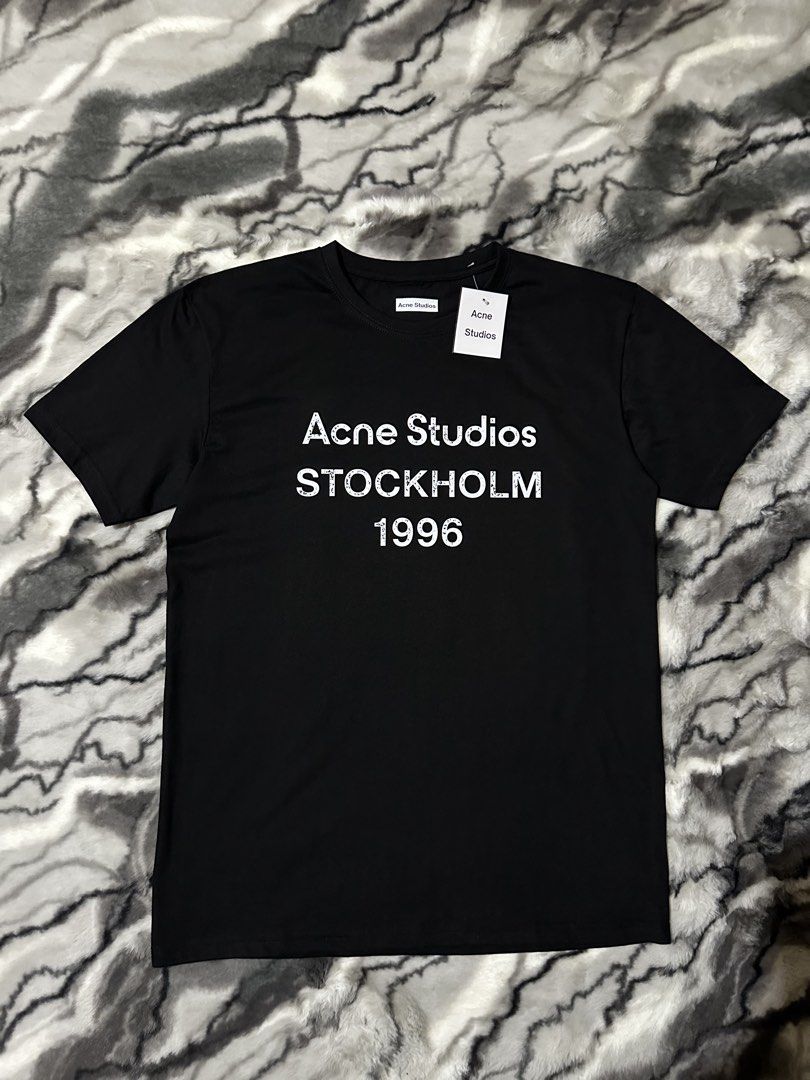 ACNE STUDIOS STOCKHOLM TEE (Category: Activewear) located in Rizal. Submitted by trendtees_875 (Listing ID 1470955678, Image 3). Description: How to look expensive without breaking the bank. 🖤 Elevate your everyday style with a clean, minimalist design. Perfect for effortless streetwear and a premium-looking outfit without the premium price tag. ✨ Details: • 100% Premium Cotton • Regular Fit • Sizes: Small–4XL • ₱749 each only 📦 PICKUP & DELIVE