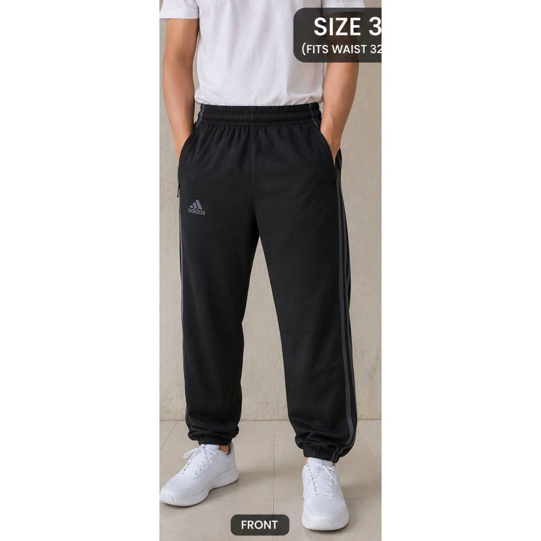 Adidas 3-stripe black training or track pants (Category: Activewear) located in General Santos City (Dadiangas). Submitted by amorhesthrift (Listing ID 1464639056, Image 1). Description: Good to new condition W-30-34 L35.6 The selected region showcases a pair of black Adidas training pants equipped with practical zipper pockets.