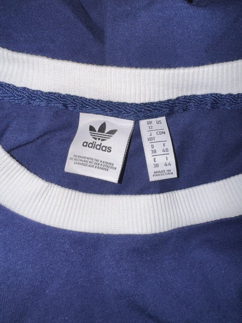 Adidas Blue White Three Stripe Dress (Category: Dresses) located in Manila. Submitted by mixi_lexi (Listing ID 1471039920, Image 2). Description: - Brand: Adidas - Color: Dark blue with white contrast details - Design: Classic 3-stripes on sleeves, ribbed crew neck and cuffs, iconic Trefoil logo on chest - Size: UK 12 / US M / D 38 / F 40 - Material: Soft and comfortable cotton blend - Condition: Excellent / Great sporty casual look - Mode of Pay