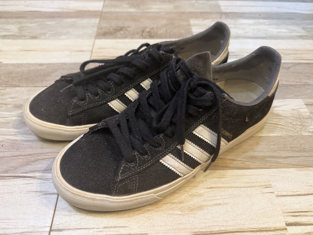 Adidas Campus BnW US 10 (Category: Sneakers) located in Manila. Submitted by safeowl.b6dbb0 (Listing ID 1471019366, Image 1). Description: - Brand: Adidas - Model: Campus - Colorway: Black Suede with White Stripes and Laces - Soles: Gum rubber with great traction - Details: Iconic gold foil branding on side panels and heel tabs - Condition: Pre-loved (shows wear on interior insoles, minor scuffs on white midsoles, and cracking on leather heel tab