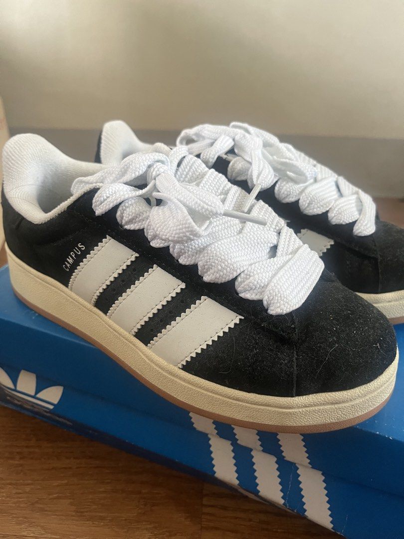 Adidas Campus Core Black White (Category: Sneakers) located in Manila. Submitted by aaa0ki (Listing ID 1470956529, Image 1). Description: - Model: Adidas Campus 00s - Colorway: Core Black and White - Size: US 6 / UK 4.5 / FR 37 1/3 / JP 230 - Material: Premium suede upper with iconic three stripes branding - Extras: Includes signature thick chunky laces - Packaging: Comes with original blue shoebox - Condition: Brand new in box.
