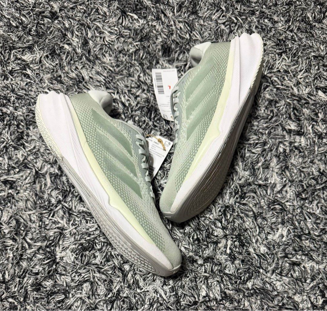 Adidas Green Running Shoes (Category: Sneakers) located in Calamba. Submitted by saiphsavion (Listing ID 1471057068, Image 1). Description: - Brand: Adidas - Color: Minty green with white soles - Condition: Brand new with tags, never worn, straight from the store - Features: Lightweight mesh upper, lace-up style, clean tread.