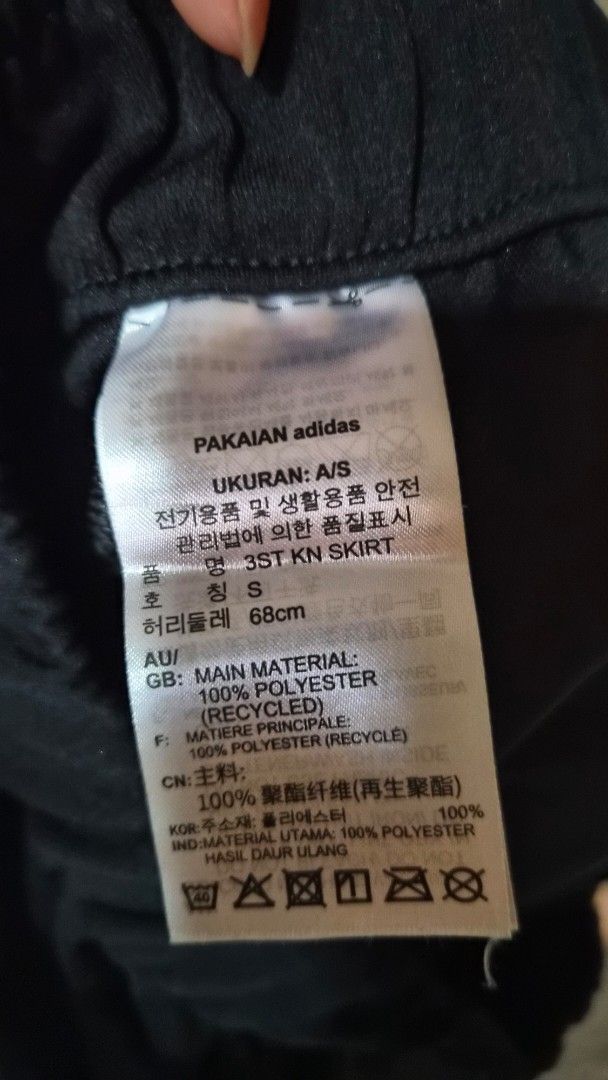 Adidas Maxi Skirt (Category: Skirts) located in Makati City. Submitted by lovedbykimmi (Listing ID 1470985613, Image 3). Description: - Brand: Adidas - Item: Maxi Skirt (bought in Adidas Website) - Color: Black with iconic white 3-stripes - Size: S (Waist: 68cm / Asia S / US S) - Fits 23 waist up to 26" - Material: 100% Recycled Polyester (Lightweight and breathable) - Features: Elastic waistband with adjustable drawstring - Pockets on both sides