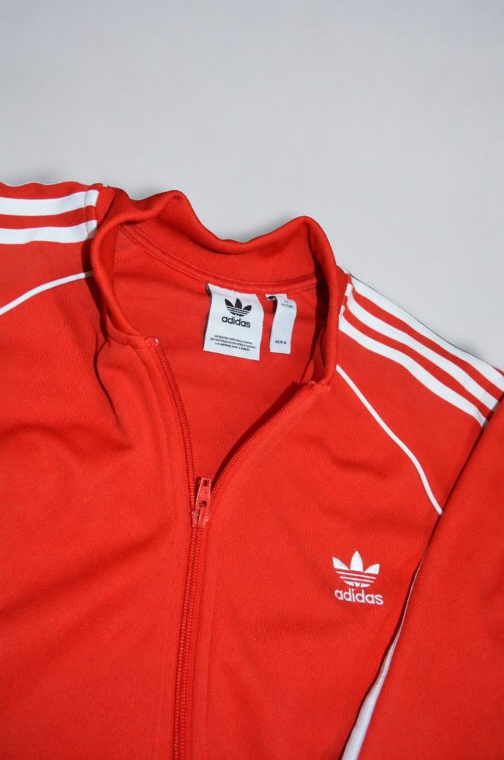 Adidas Originals Red Track Jacket (Category: Coats, Jackets and Outerwear) located in Manila. Submitted by yvl.mnl (Listing ID 1470975189, Image 2). Description: 24.5x29 no issue @yvl.mnl on IG.