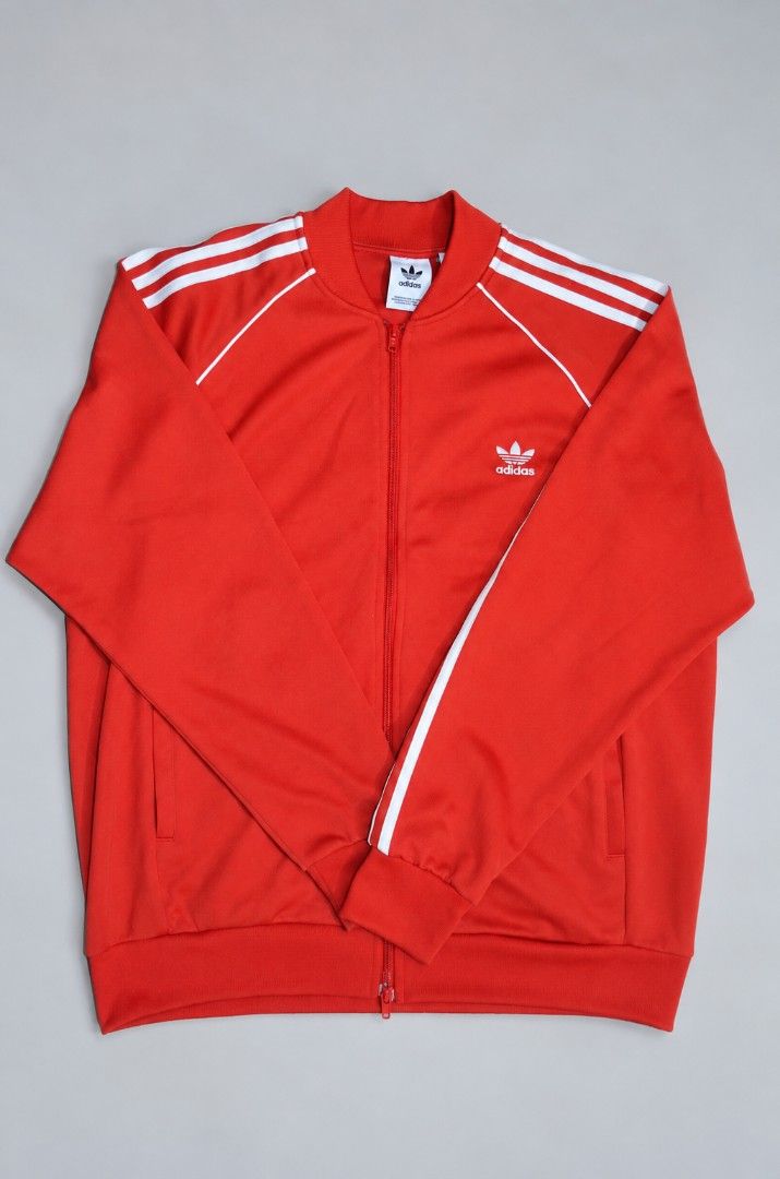 Adidas Originals Red Track Jacket (Category: Coats, Jackets and Outerwear) located in Manila. Submitted by yvl.mnl (Listing ID 1470975189, Image 1). Description: 24.5x29 no issue @yvl.mnl on IG.