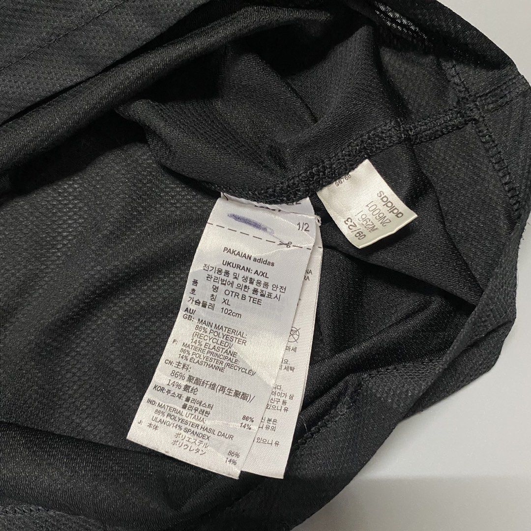 Adidas OTR Running Tee Black Size XL (Category: Activewear) located in Pagadian. Submitted by 420thriftclothes (Listing ID 1471100077, Image 2). Description: - Brand: Adidas - Color: Black - Size: XL - Material: Recycled polyester and elastane blend - Fabric: Lightweight mesh for breathability and cooling - Design: Reflective three-stripe branding on sleeves - Detail: Interior collar features printed running text tape - Origin: Made in Indonesia 