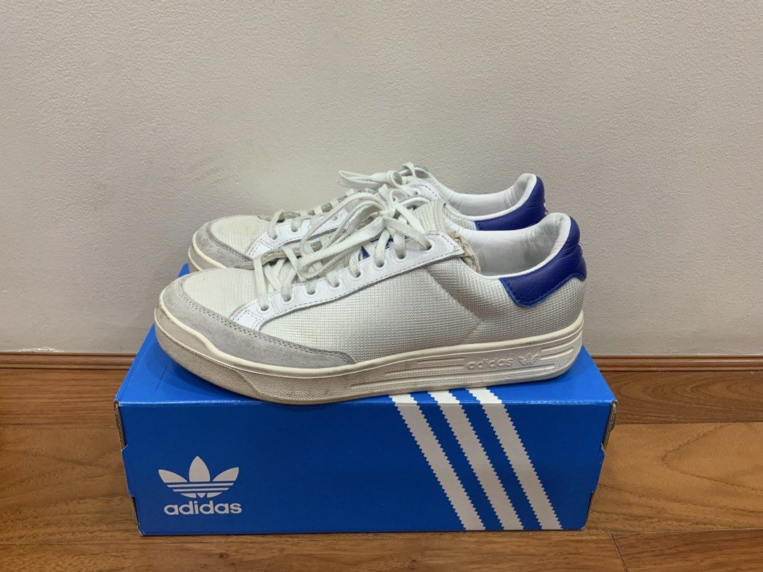 Adidas Rod Laver Kith Classics Program Royal (Category: Sneakers) located in Mandaluyong City. Submitted by plaza.esquinita (Listing ID 1471093161, Image 1). Description: - Brand: Adidas x Kith Rod Laver - Size: US 9 / EU 42 2/3 - Colorway: White mesh upper, suede toe mudguards, royal blue heel tabs - Details: Kith branding on one heel, Adidas trefoil on the other - Inclusions: Original blue shoebox included - Condition: Minor scuffs on the midso