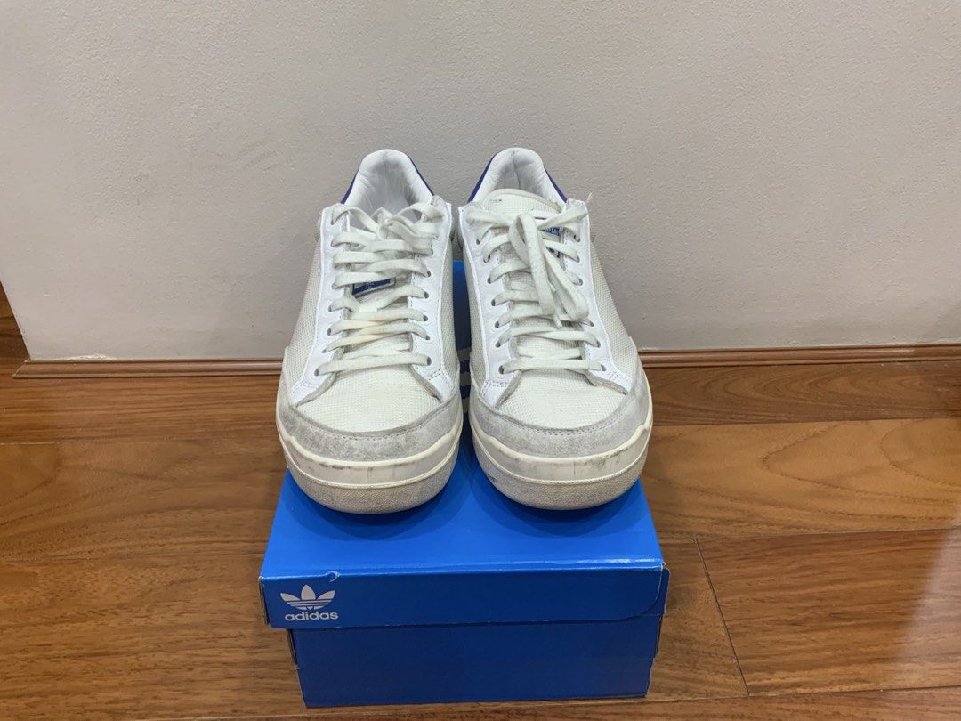 Adidas Rod Laver Kith Classics Program Royal (Category: Sneakers) located in Mandaluyong City. Submitted by plaza.esquinita (Listing ID 1471093161, Image 2). Description: - Brand: Adidas x Kith Rod Laver - Size: US 9 / EU 42 2/3 - Colorway: White mesh upper, suede toe mudguards, royal blue heel tabs - Details: Kith branding on one heel, Adidas trefoil on the other - Inclusions: Original blue shoebox included - Condition: Minor scuffs on the midso