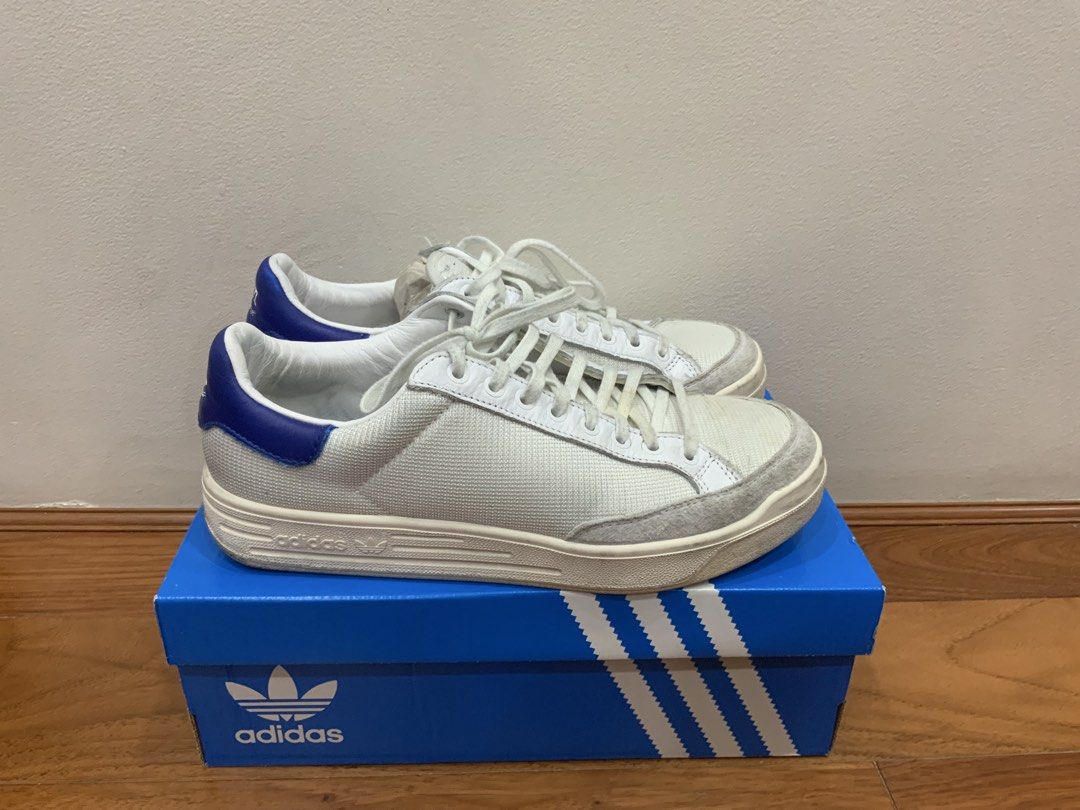 Adidas Rod Laver Kith Classics Program Royal (Category: Sneakers) located in Mandaluyong City. Submitted by plaza.esquinita (Listing ID 1471093161, Image 3). Description: - Brand: Adidas x Kith Rod Laver - Size: US 9 / EU 42 2/3 - Colorway: White mesh upper, suede toe mudguards, royal blue heel tabs - Details: Kith branding on one heel, Adidas trefoil on the other - Inclusions: Original blue shoebox included - Condition: Minor scuffs on the midso