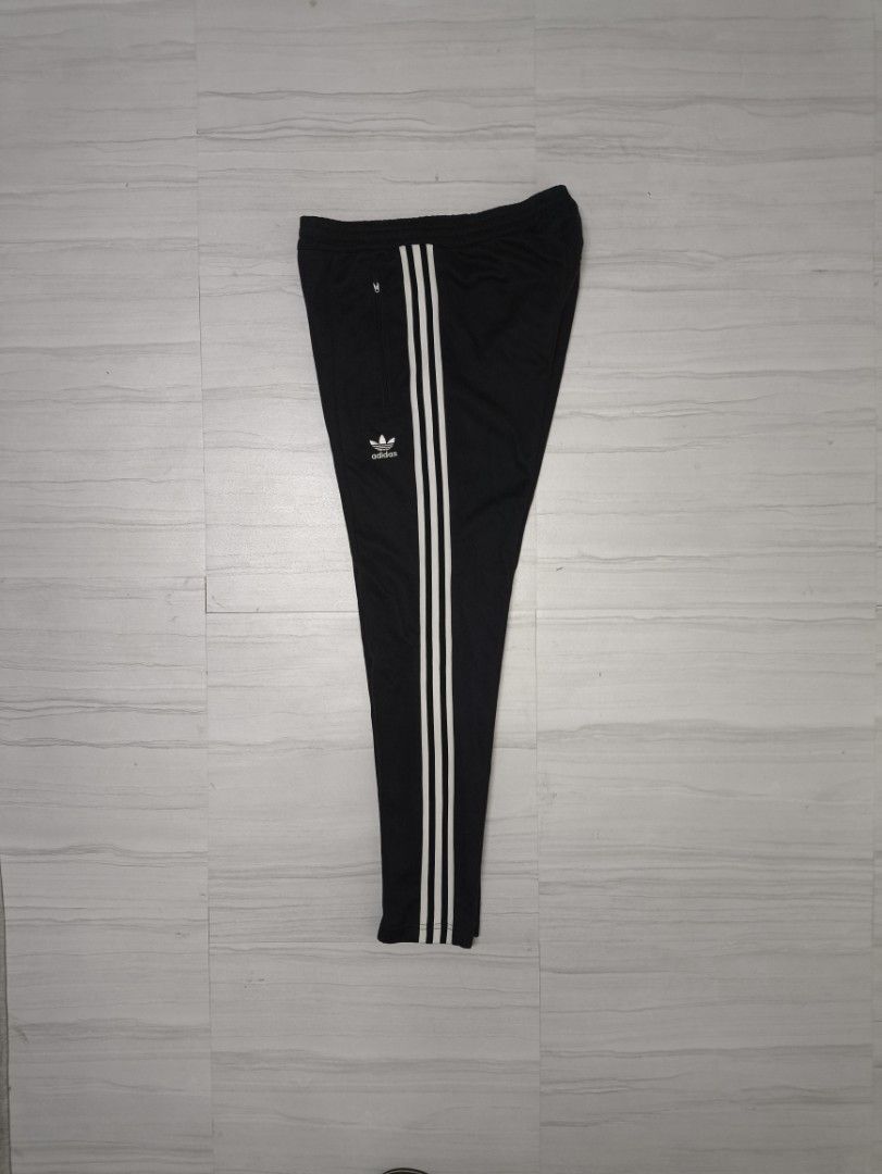 ADIDAS TRACK PANTS (Category: Joggers) located in Lupon. Submitted by thriftnikent (Listing ID 1470937976, Image 1). Description: ISSUE- MISSING LACE/MINIMAL LINTS COLOR RATE - 10/10 DIMES - 28-32X38.