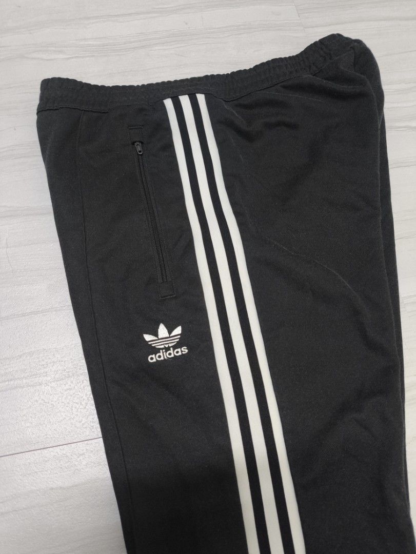 ADIDAS TRACK PANTS (Category: Joggers) located in Lupon. Submitted by thriftnikent (Listing ID 1470937976, Image 2). Description: ISSUE- MISSING LACE/MINIMAL LINTS COLOR RATE - 10/10 DIMES - 28-32X38.