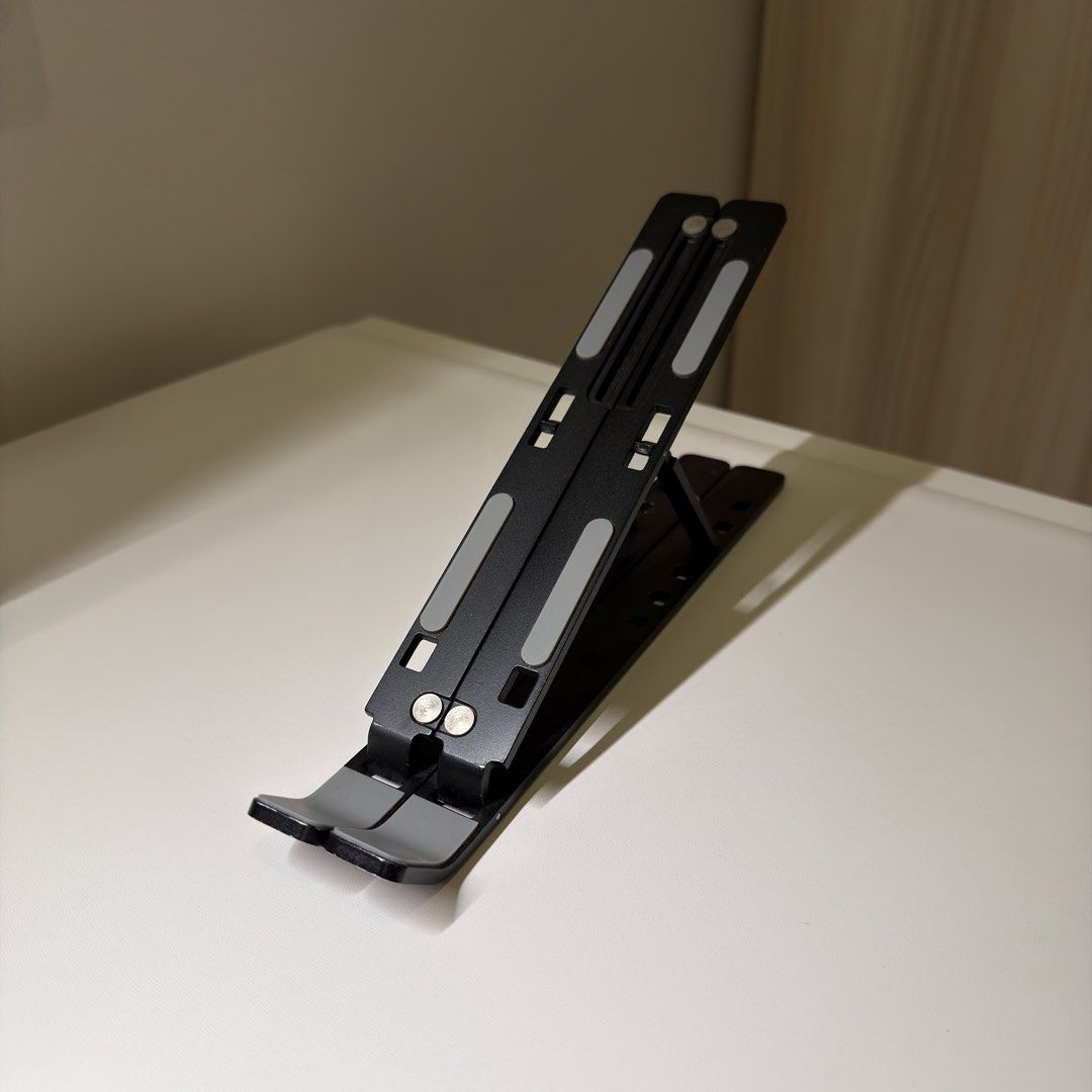 Adjustable foldable portable laptop stand (Category: Laptop Bags & Sleeves) located in Quezon City. Submitted by aj.mnl (Listing ID 1471090968, Image 3). Description: .