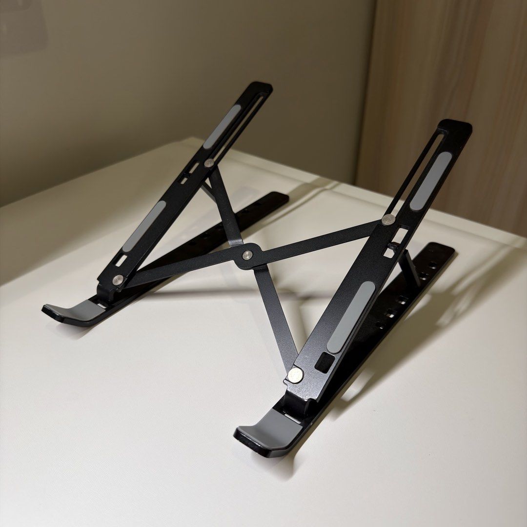 Adjustable foldable portable laptop stand (Category: Laptop Bags & Sleeves) located in Quezon City. Submitted by aj.mnl (Listing ID 1471090968, Image 1). Description: .