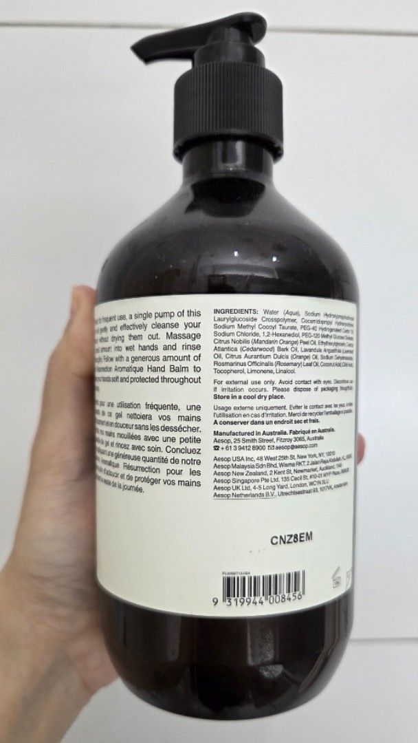 Aesop Resurrection Aromatique Hand Wash (Category: Hands & Nails) located in Muntinlupa City. Submitted by declutter.project (Listing ID 1470962221, Image 2). Description: - Brand: Aesop - Product: Resurrection Aromatique Hand Wash - Size: 500ml - Scent: Mandarin rind, rosemary leaf, and cedar atlas - Formula: Gentle cleansing gel that cleans without stripping natural moisture - Packaging: Classic amber plastic bottle with working pump mechanism.