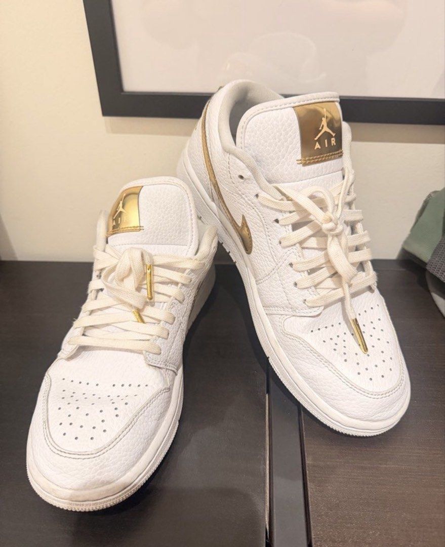 AIR JORDAN 1 LOW (Gold/Wht) 7 (Category: Sneakers) located in Batangas. Submitted by melissa.closet (Listing ID 1470962190, Image 2). Description: LP POSTED!!! Original 💯 SIZE: US7 /24cm CONDITION: EXCELLENT. Used 3x then stored. No more box sorry. Just the pair. Selling low!! LP POSTED!! Bought for P6295 at ATC Nike Flagship Store. If in doubt dont buy!!.