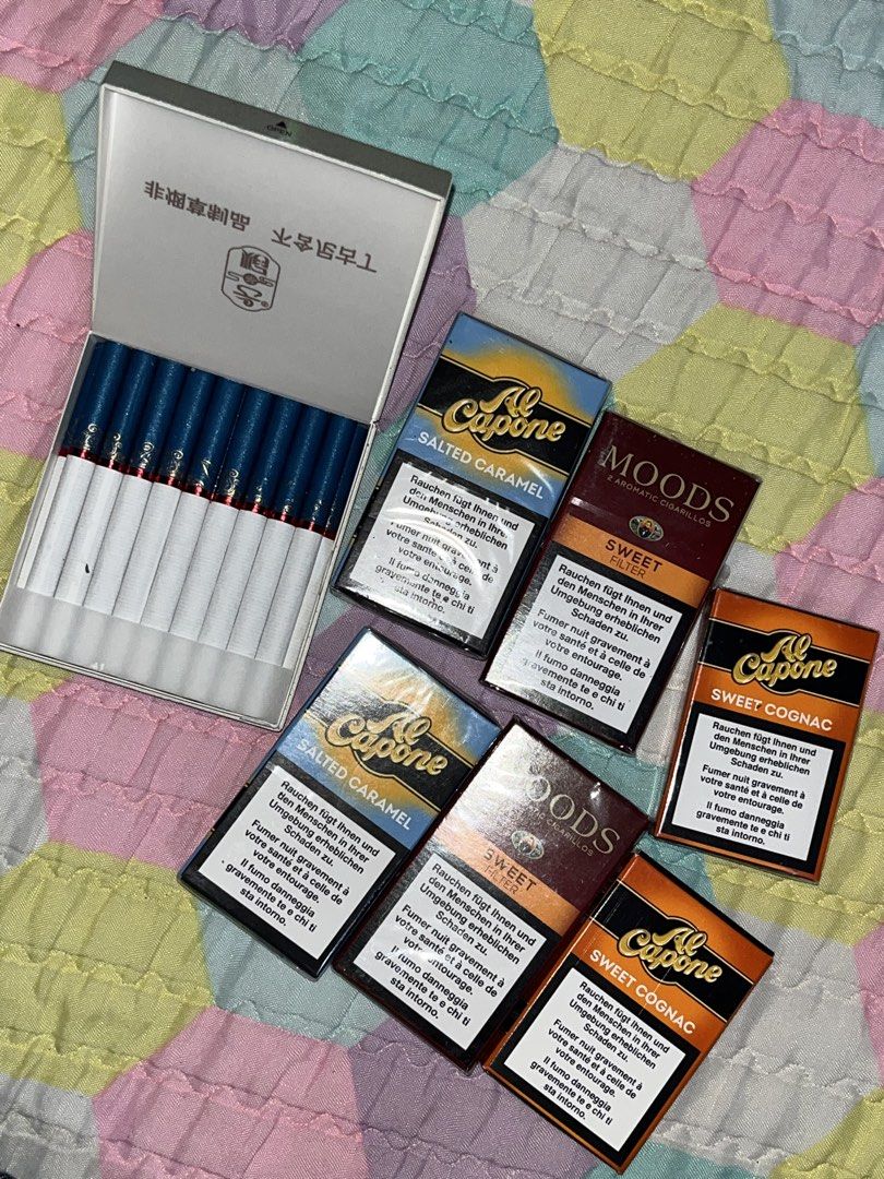 Al Capone Moods Big Panda Assorted Packs (Category: Vintage Collectibles) located in Antipolo. Submitted by einjul (Listing ID 1471075908, Image 1). Description: - Assorted flavored cigarettes and cigarillos up for grabs - Variants include Al Capone Salted Caramel, Al Capone Sweet Cognac, and Moods sweet filter packs - Special box of Big Panda herbal cigarettes also included - Condition: Unsealed (actual items shown in photos) - Great variety pac