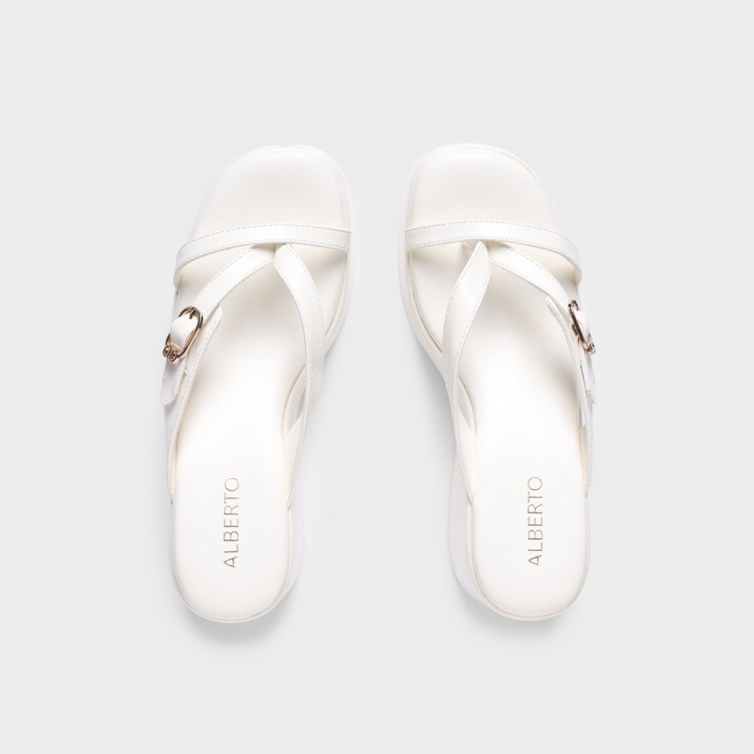 Alberto White Platform Wedge Sandals (Category: Wedges) located in Manila. Submitted by sarah_200130 (Listing ID 1471023162, Image 3). Description: - Brand: Alberto - Style: Thong strap platform wedge sandals with side buckle detail - Color: White - Heel: Chunky heel for added height and stability - Inclusion: Original shoebox included - Mode of Payment: GCash, BPI, or COD via Shopee/Lazada checkout - Shipping: Via J&T Express (Buyer shoulders sh