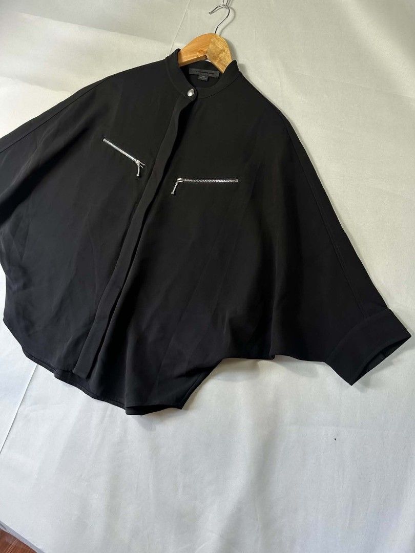 Alexanderwang Batwing Type Shirt (Category: Others Tops) located in Caloocan City. Submitted by zealbear_441c38 (Listing ID 1470979381, Image 2). Description: Title - Alexander Wang Model/Name - Size on Tag - O Conditiion - Excellent as new Dimension (WxLxH) - 25 inches length Category- Casual/Formal Fitting - Loose Made in - China Material - Color - Black Design - Batwing Style Year - Inclusion - None Note - All sales are final, Please check det
